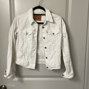 Small white jean jacket.